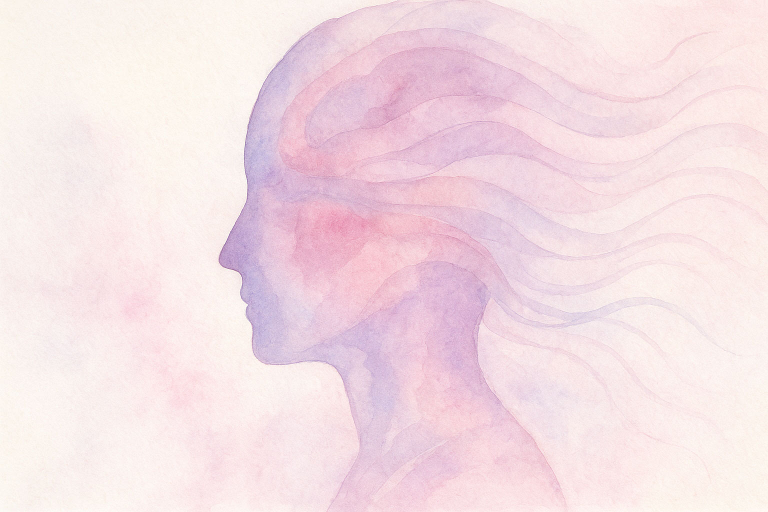Watercolor layers form a human profile, abstractly illustrating the power of the subconscious mind.